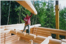 Mike guiding floor joist